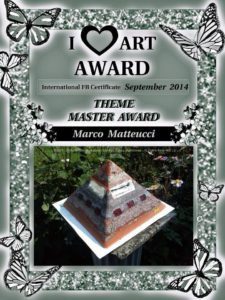 Orgonite pyramid Art award, working beeswax for orgonite by Marco Matteucci aka Marek Sheran